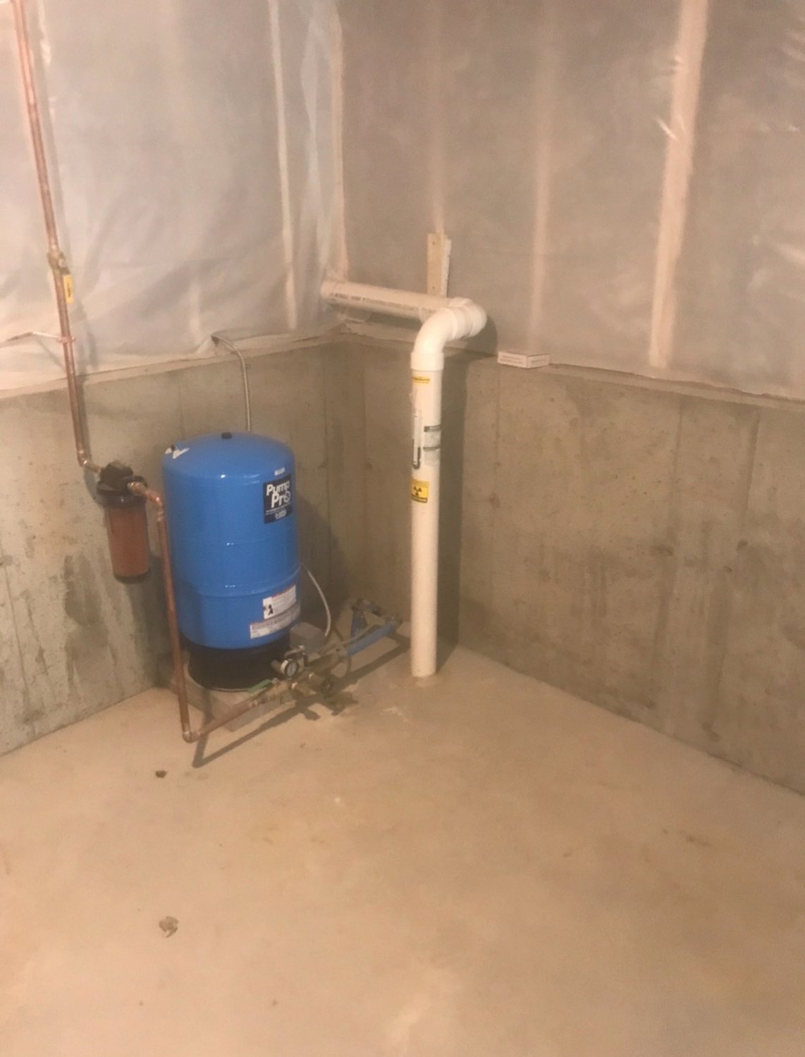 RADON SUCTION: This is the basement where we do the suction of the radon in the white pvc to exhaust outside through the mitigation fan. (Photo courtesy RMS: Radon Mitigation Services)
